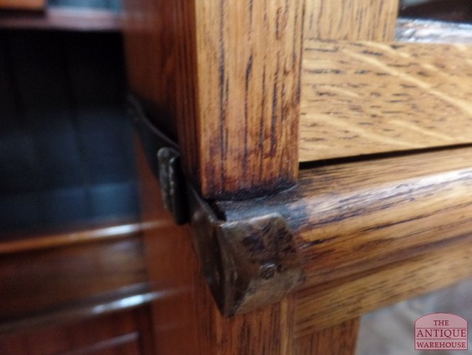 Aanvulling van een hoge eiken Globe Wernicke boekenkast 2