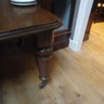 Antique English oak concertina dining table, extendable with double moulding edges 2