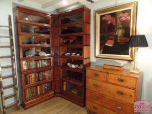 antique elastic, sectional mahogany Globe Wernicke corner bookcase