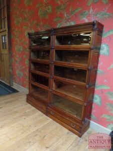 antique mahogany sectional Globe Wernicke bookcase, antieke mahonie stapelbare Globe Wernicke boekenkast Rolls Royce onder Globe Wernicke boekenkasten