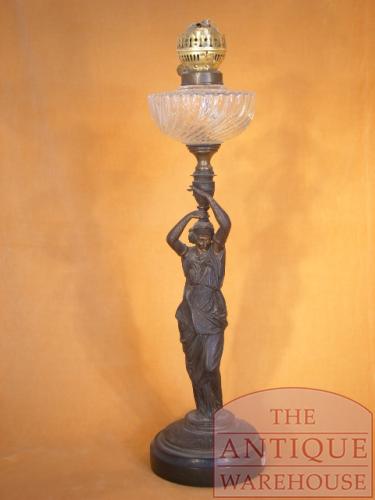 Bronzen vrouw torst lamp