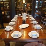 Antieke mahoniehouten uitschuif tafel met drie tussen 2