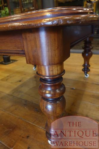 Antieke mahoniehouten uitschuif tafel met drie tussen 3