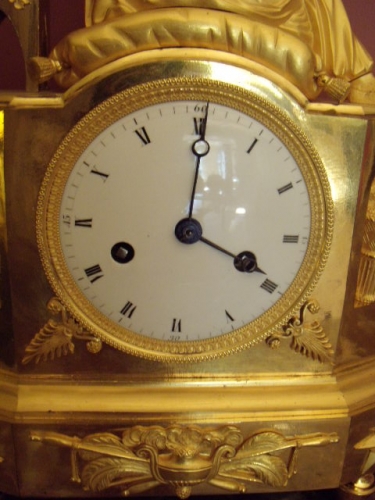 Vergulde empire pendule