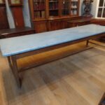 Antique oak table with traverse and zinc top 1